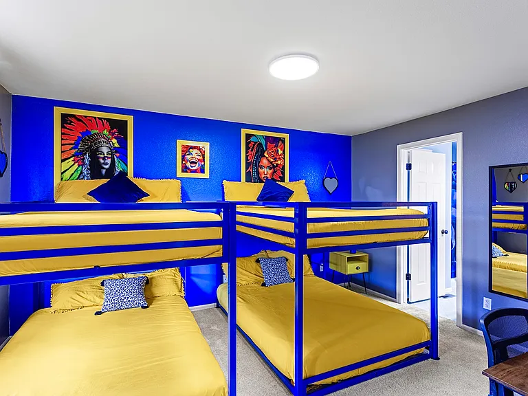 Fun and playful bunk bed room with colorful decor, perfect for kids and sleepovers.