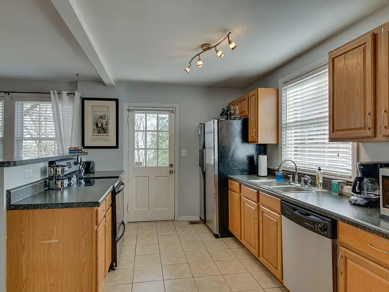 Great natural light in the kitchen. Plenty of counter top and cabinet space.