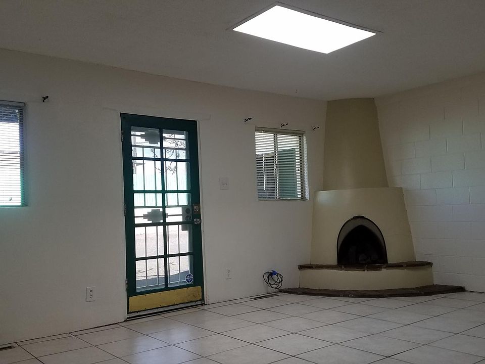 Front door, Kiva 
Skylight brings in natural light. (Windows have been replaced with much better insulated windows)