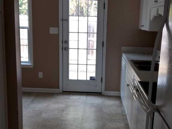 Eat in kitchen, laundry closet, back door to fenced yard