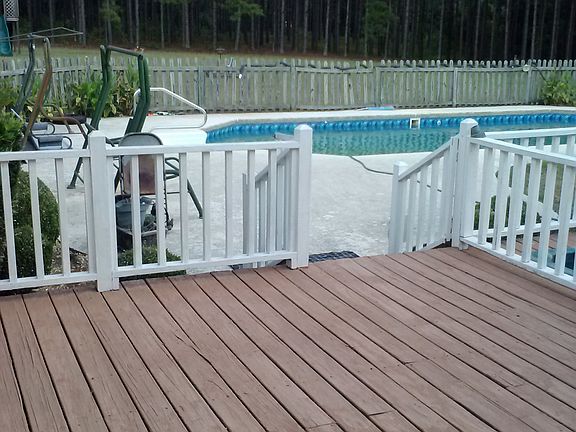 Deck With Jacuzzi And Pool