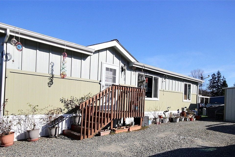 Welcome to Wonderland Estates, a 55+ age park!  Built in 2014, this home features 50-year cement siding, it is sheetrocked with rounded corners and you'll find designer colors, vaulted ceilings and white 6-panel doors & Colonial molding throughout. This home also boasts a shed and raised garden beds in the rear yard.  It's also an excellent commuter's location with easy access to Hwy. 169 and I-405.  Information on lenders who finance manufactured homes in parks is attached to the this MLS listing. Please reach out to your agent and they can provide this information to you.  