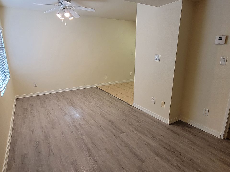 Large living room with in kitchen dining area