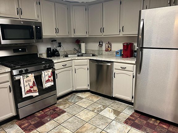 2nd image of 322 E 60th Ct
