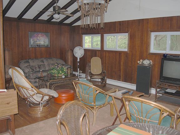 Hardwood floor with beam ceiling