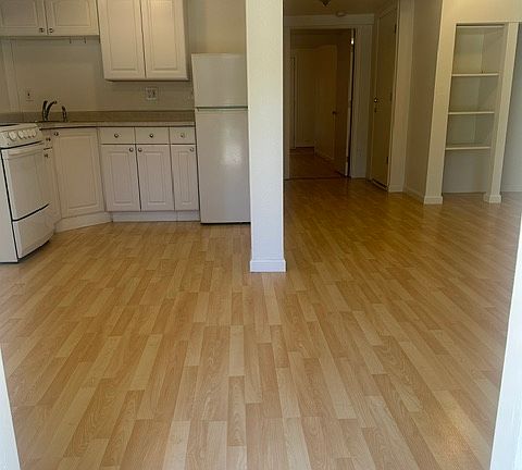 front entry, kitchen to the left and living room to the right