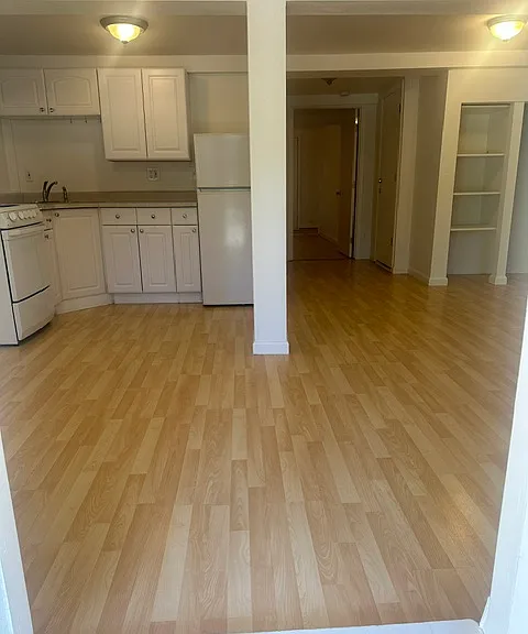 front entry, kitchen to the left and living room to the right