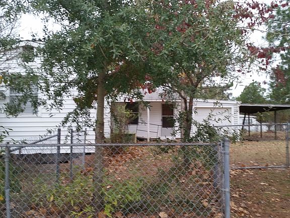 Side view of home with garage and lean 2