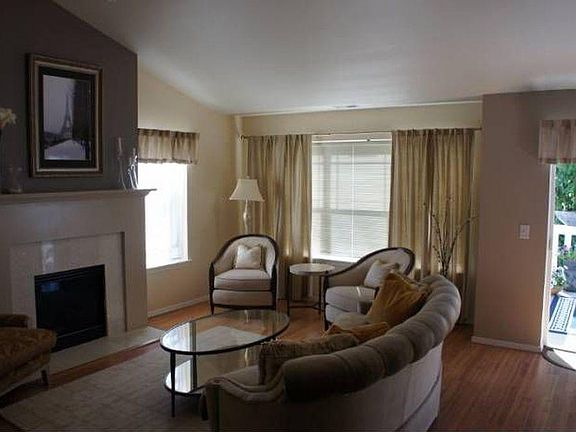 Vaulted ceilings and hardwoods throughout main area