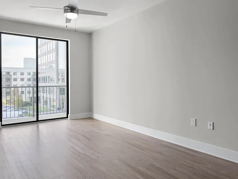 Living Room with Balcony and Hard Surface Flooring