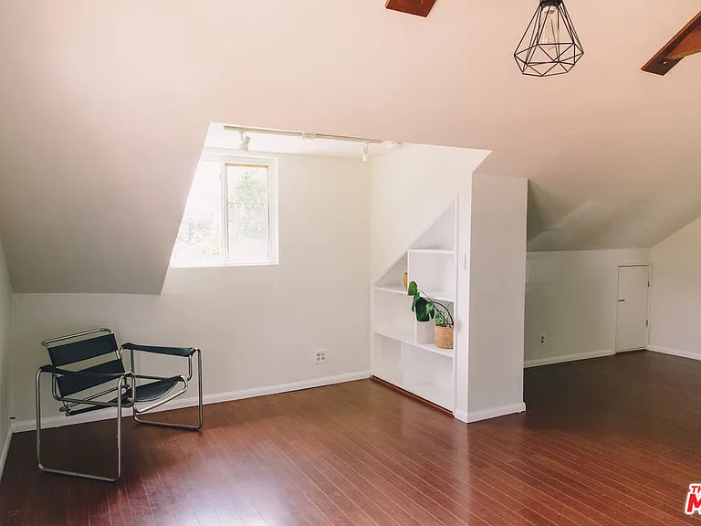 Reading Nook with Treetop Views in Primary Suite