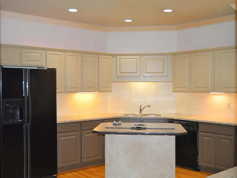 KItchen area with island and bar area
