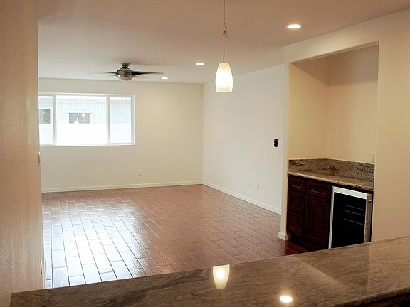 Living room dining room with wet bar