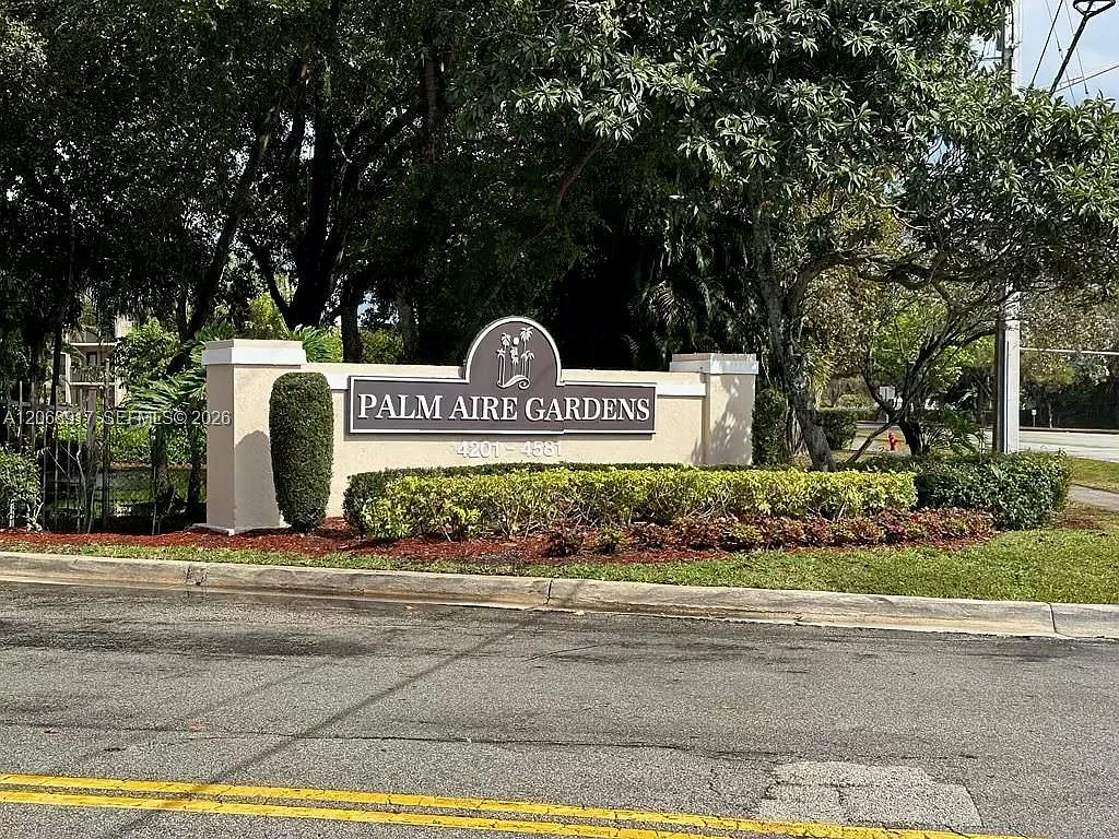 Palm Aire Gardens Condo — Photo 1