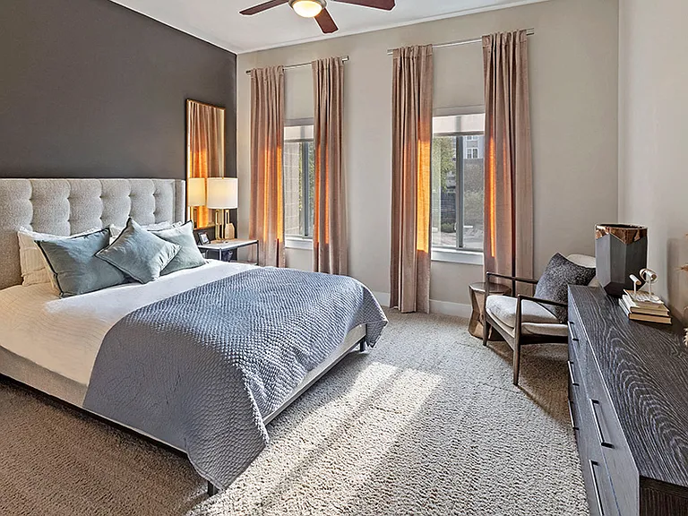 Spacious bedrooms and closets complete with solar window shades