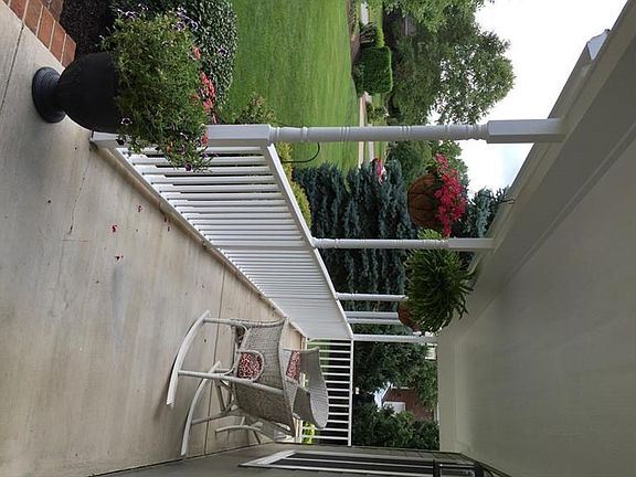 The perfect porch to enjoy coffee, conversation and a good book!