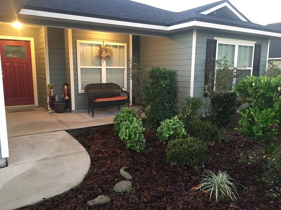 Covered front porch with welcoming entrance
