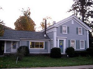 Main view of home showing front door and part of the car port!