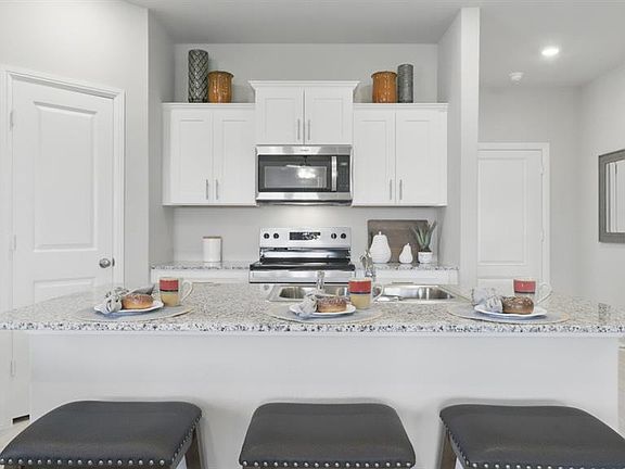 Kitchen- All Home and community information, including pricing, included features, terms, availability and amenities, are subject to change at any time without notice or obligation. All Drawings, pictures, photographs, video, square footages, floor plans, elevations, features, colors and sizes are approximate for illustration purposes only and will vary from the homes as built.