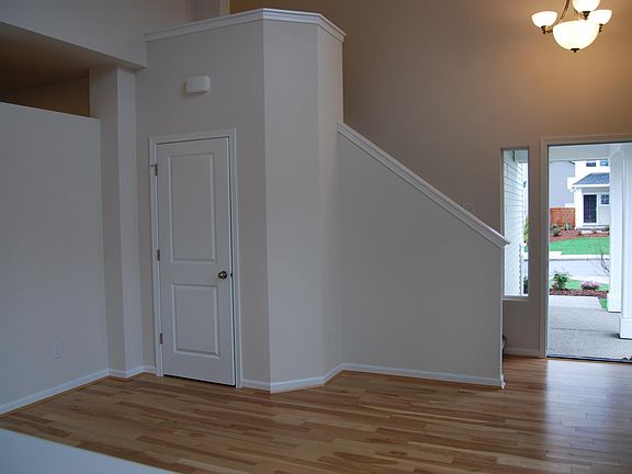 Living Room area with high vaulted ceiling