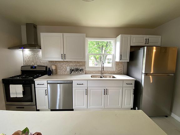 Brand new appliances including dish washer completes this kitchen.