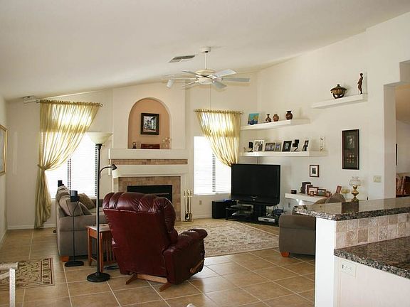 Inviting fireplace and pre-wired for surround sound