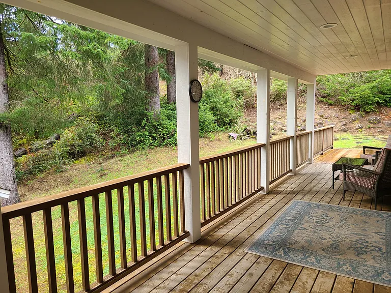 Beautiful back porch to enjoy your morning coffee