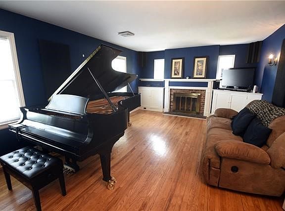 Living Room is very large with a fireplace anchoring one end.