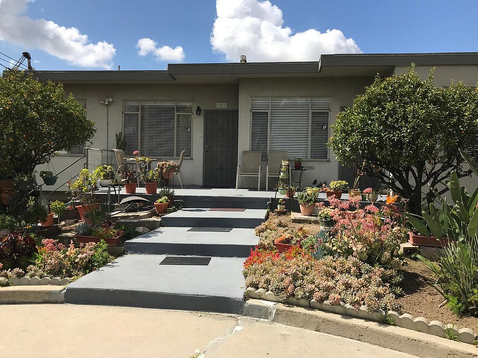 Front of Apartment (4 plex). Circular Driveway provides off street parking.