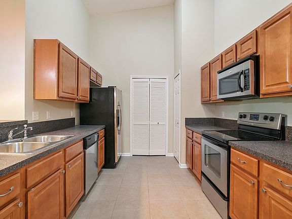 3rd image of 6965 Ortega Woods Dr Unit 6-12