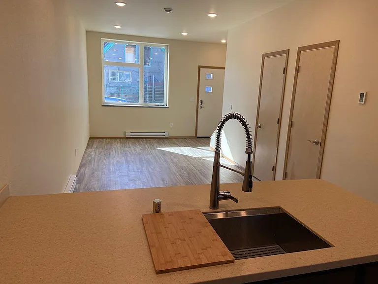 Kitchen island, sink, living room