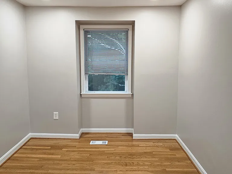 2nd bedroom with hardwood and full closet