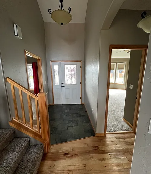 Entry - Master Suite on right, Bedroom/Office on left.