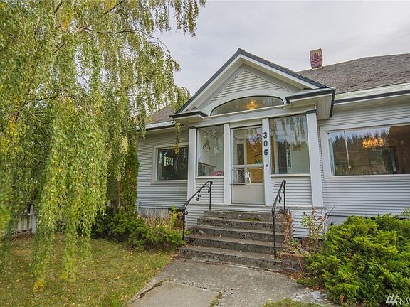 Enclosed front porch.