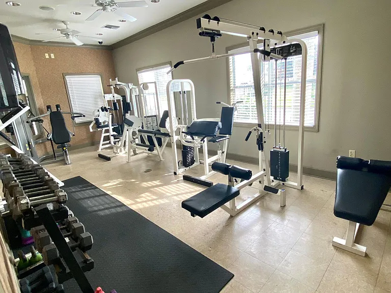 Fitness center has a weights room & a cardio room