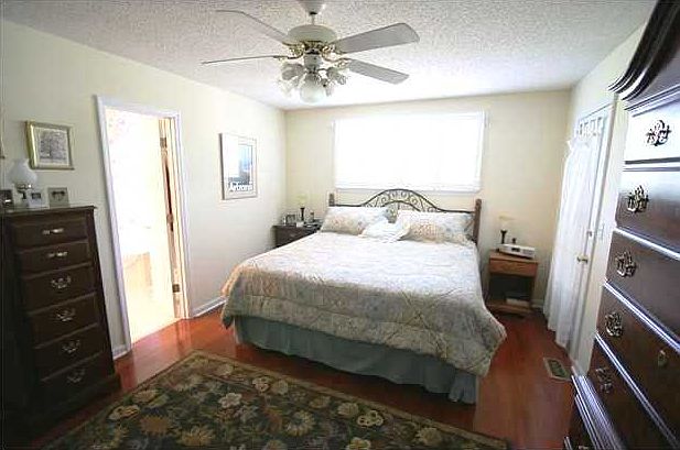 1st floor Master Suite has new bathroom & direct acces to screened porch
