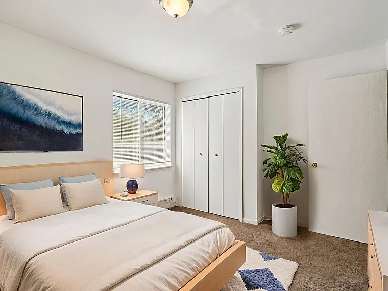 Generous bedrooms offer ample space for large beds and personalized decor (virtually staged), professionally operated by Highlands Vista Group.
