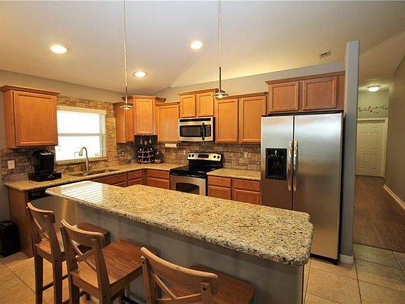 5th image of 12303 Holmwood Greens Pl