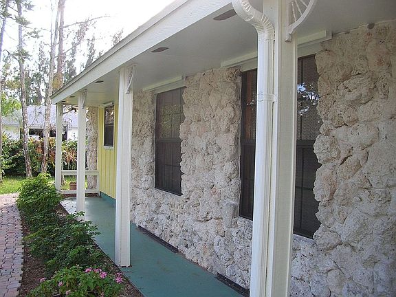 House front has rare, beautiful coral rock veneer!