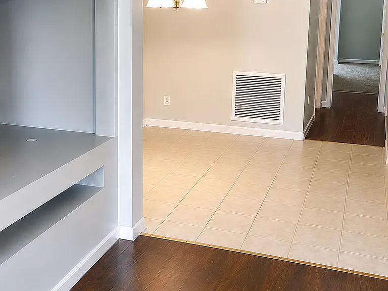 Dining room across from kitchen and tv nook in living room