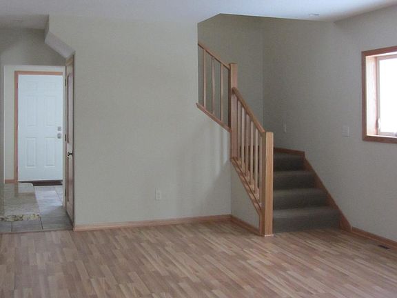 Stairs leading to bedrooms and bath