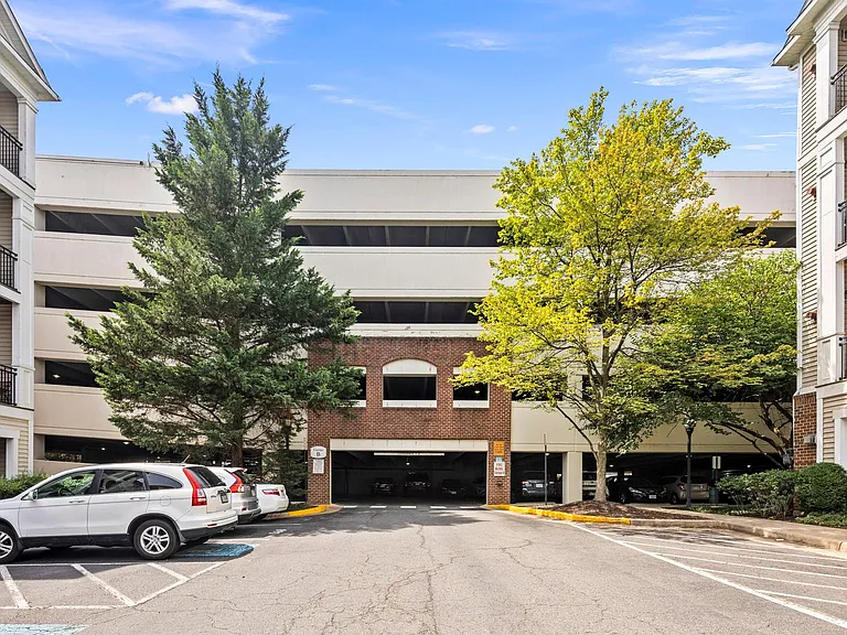 Gated parking house with 2 assigned parking spaces. Level access to unit.