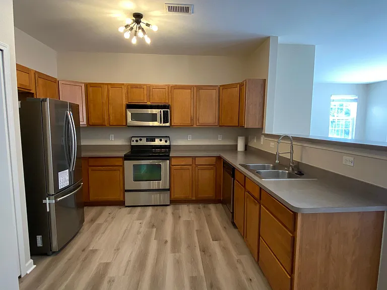Kitchen with all stainless steel appliances
