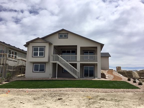 Craftsman Covered Deck Photo representing home to be built and may demonstrate optional features