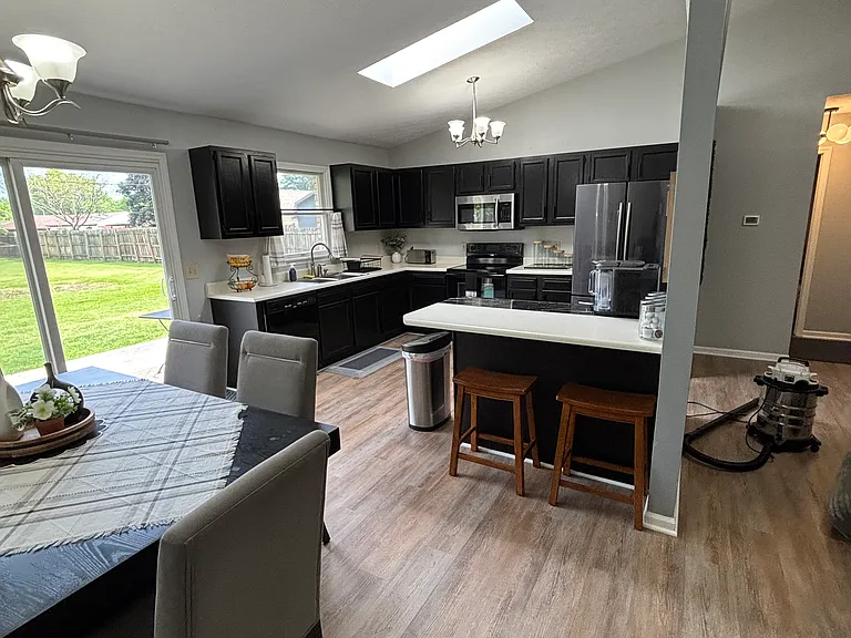 View of kitchen from dining table.