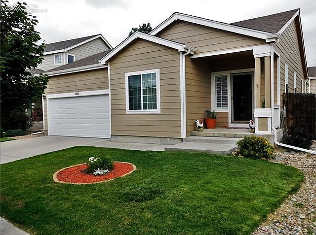 Beautiful home with new exterior paint and class 4 shingles