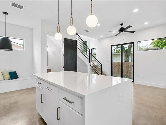 Waterfall island with enough space for 5+ chairs