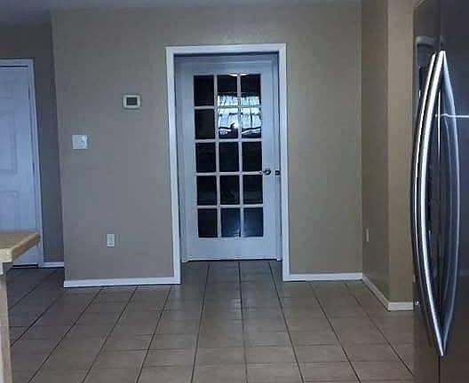 Dining room view from kitchen. Door leads to huge family ro