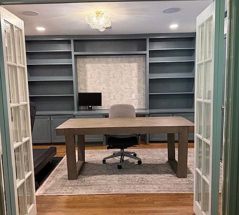 Brand new hardwoods in the office with new wallpaper