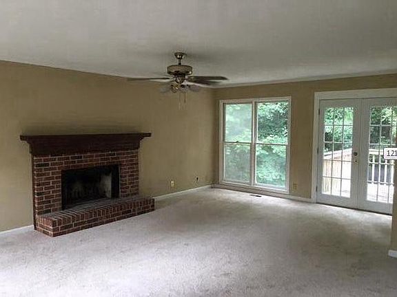 Living Room. Wood fireplace with Gas starter. New French D